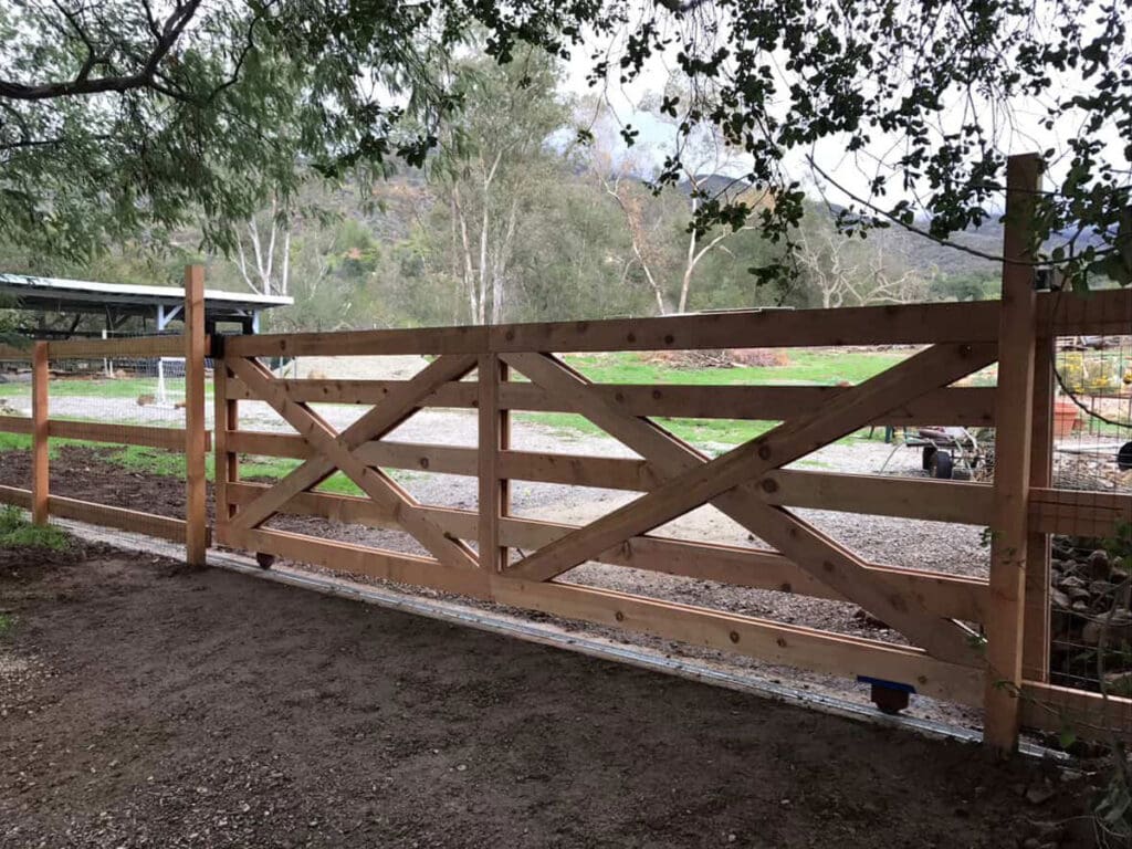wood gate with an automated opener from True West Construction's project gallery
